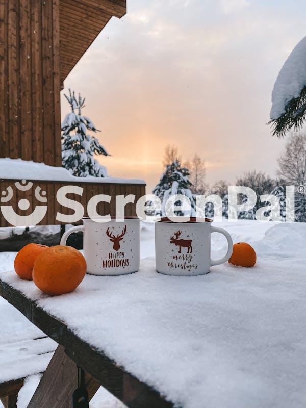 White Mugs On Snow Covered Table