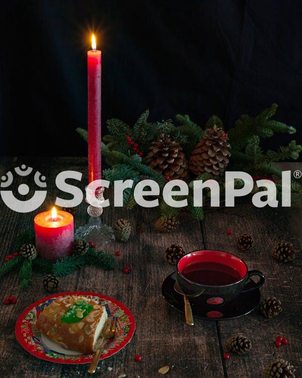 Lighted Candle On Wooden Table