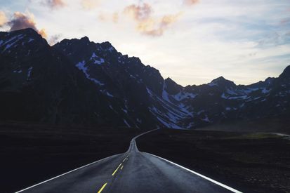 Gray Concrete Road With Mountain Ahead