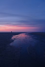 Person On Beach At Dusk