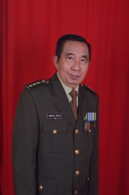 Senior Military Officer Portrait On Red Background