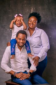 Happy Family Portrait With Young Child