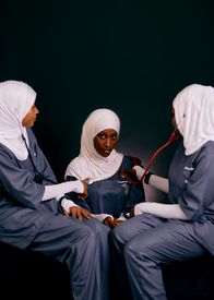 Female Healthcare Professionals In Medical Uniforms