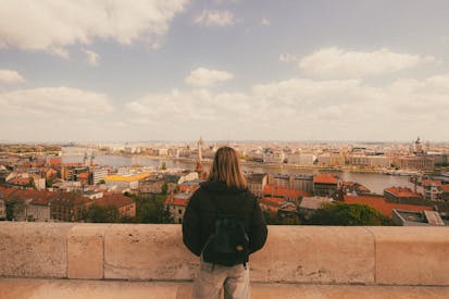 Back View Of Woman Overlooking Budapest Cityscape