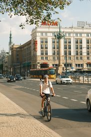 Cyclist On A Sunny Day In Warsaw