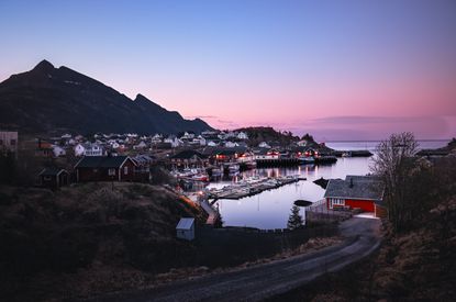 Sunset Over Picturesque Nordic Fjord Village