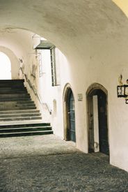 Historic European Stone Stairway With Archway