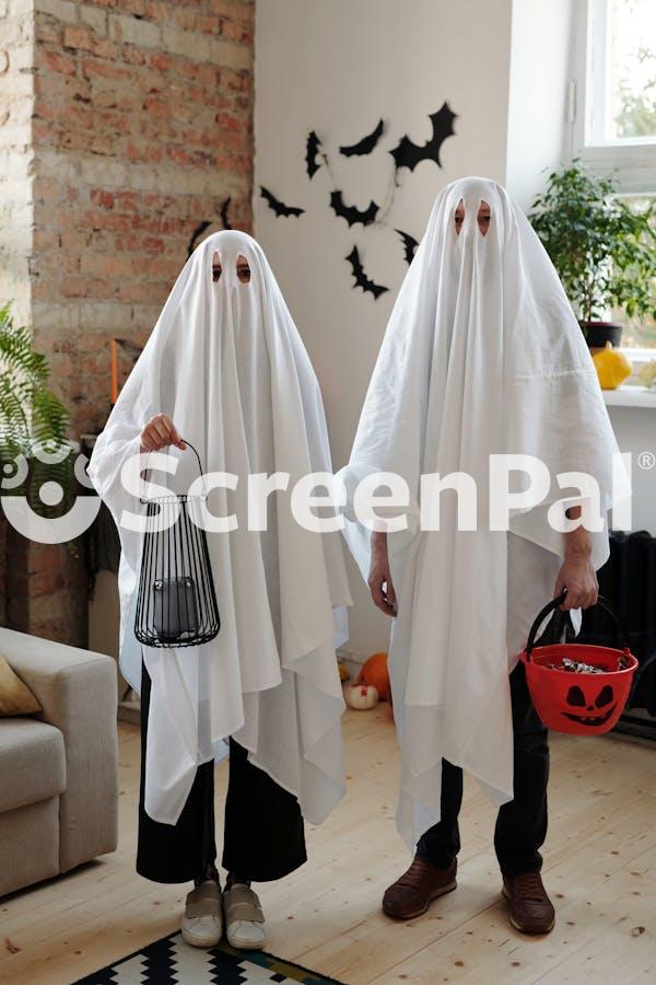 People In Ghost Costumes