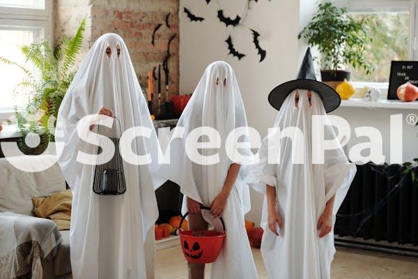 People In Ghost Costumes