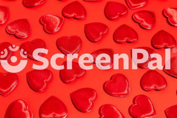 Red Hearts Against Red Background