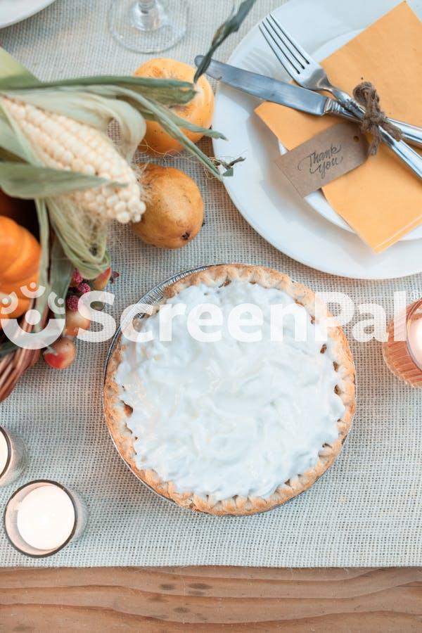 Baked Pumpkin Pie On Top Of White Sack Fabric