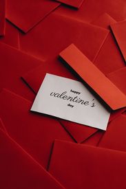 White Card On Top Of An Envelope