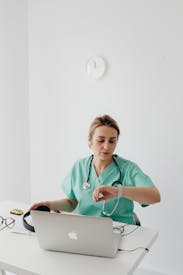 A Female Doctor Having A Video Call